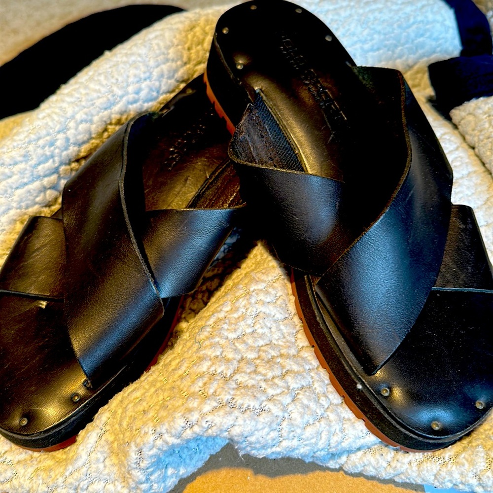 Polo Sport Black strap leather sandals with nail detail.